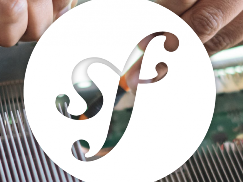 Symfony Logo over computer background